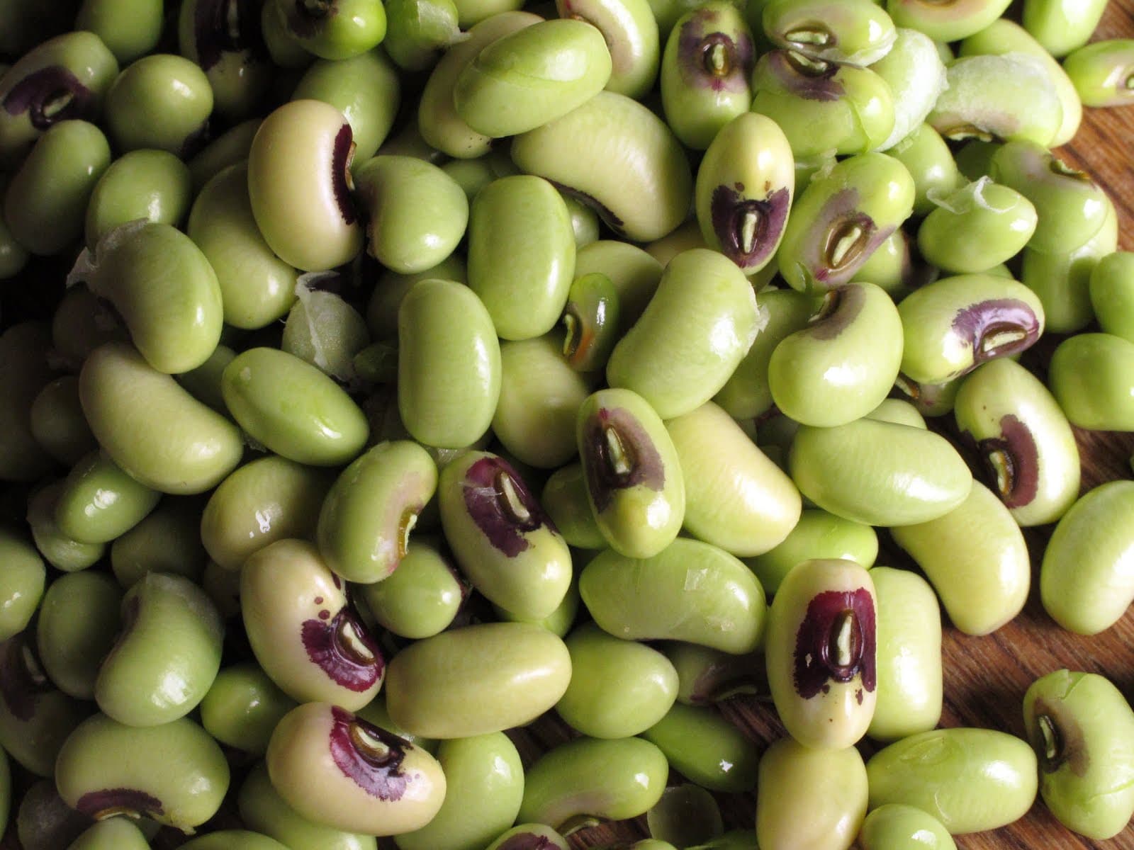 Fresh green peas lying on the table
