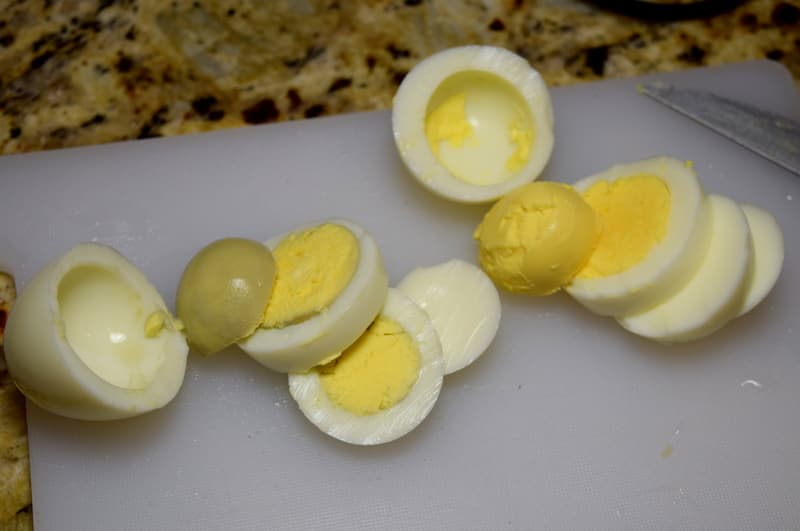 Boiled peeled eggs lying on the table