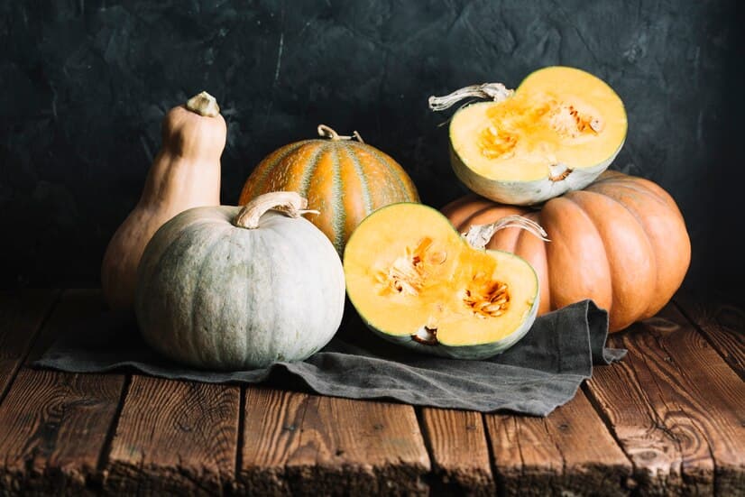 Pumpkins and Squash on a Wooden Table