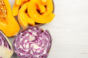 Top view of half butternut and half red cabbage